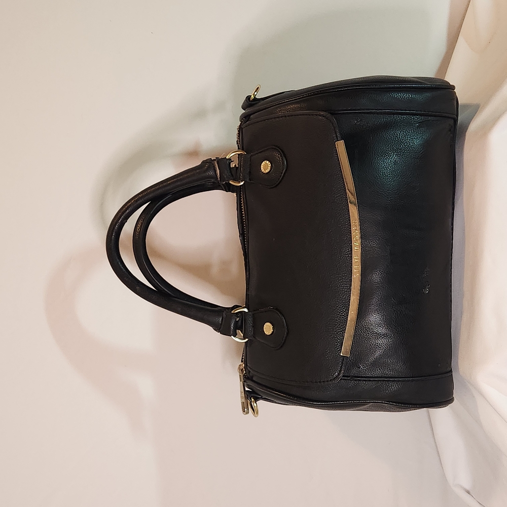 Elegant Steve Madden Black Leather Handbag with Gold Accents